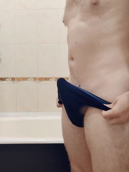 I take off my panties and show my shaved cock.